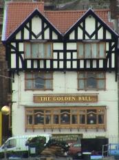 golden ball serving up a fine pint